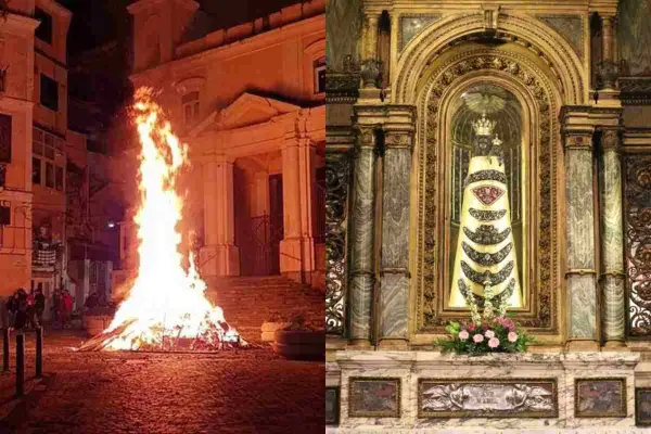 Fuoco acceso e statua della Madonna di Loreto in chiesa: immagini che evocano la devozione e le celebrazioni quando si festeggia la Madonna di Loreto.